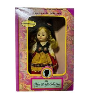 The New Bright Collection Bookcase Collectible Switzerland Doll